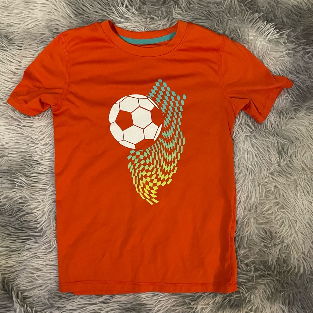 Boys “All in Motion” Soccer shirt. Size Boys Medium.
